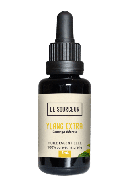 Bottle of essential oil of Ylang Extra